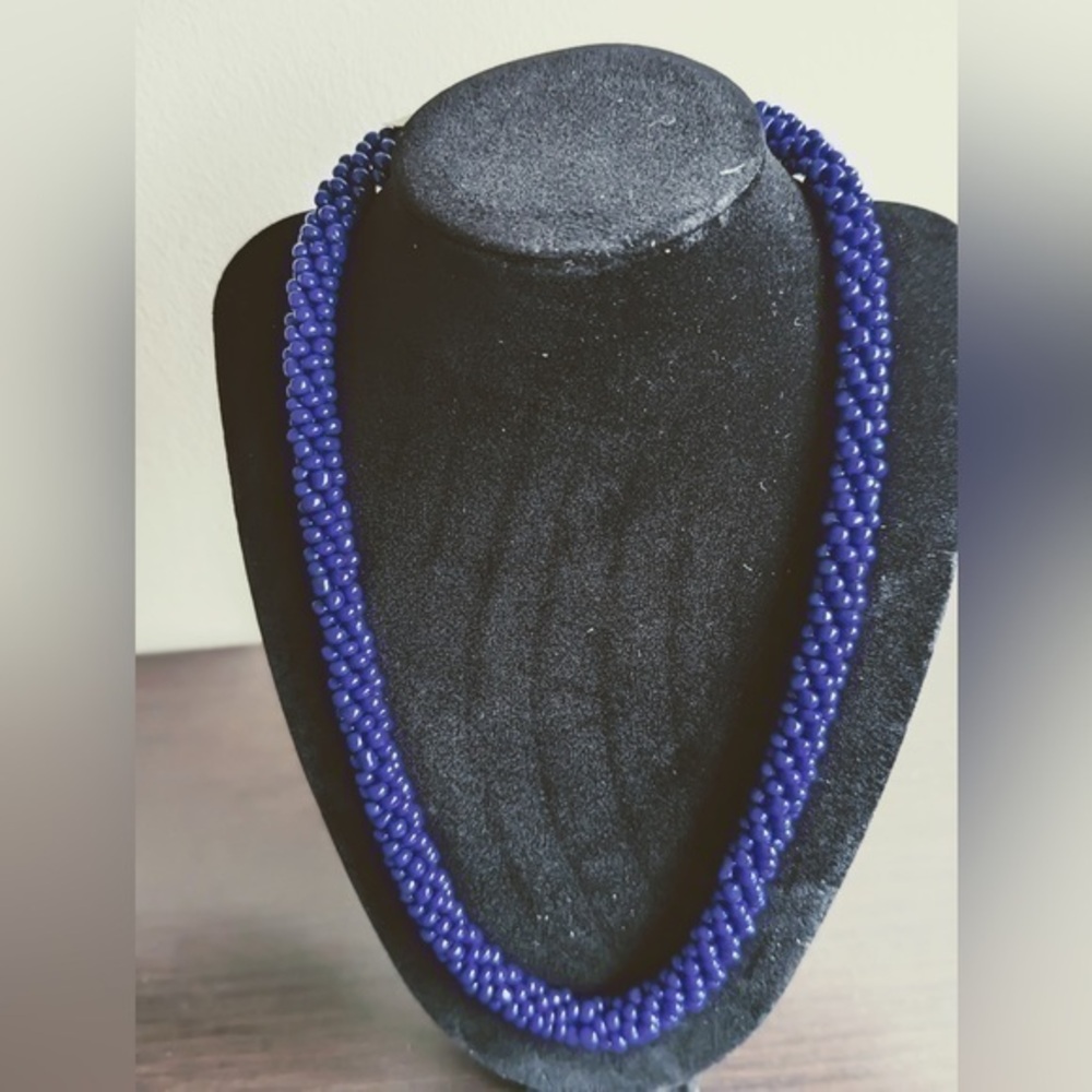 10” blue/purple beaded necklace.